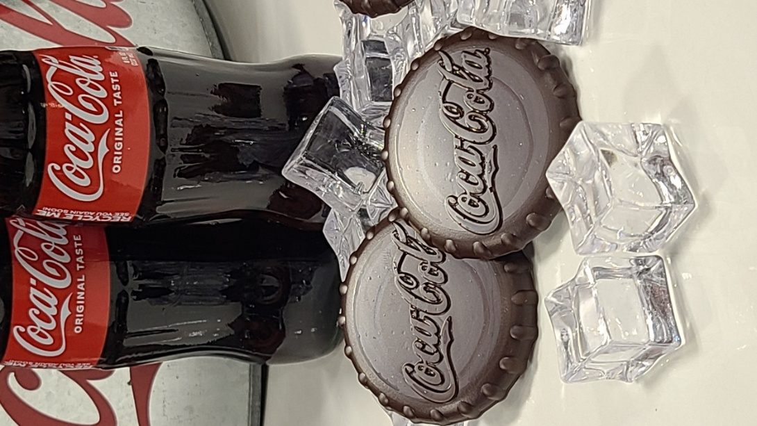 Chocolate molded and printed to look like Coca-Cola bottle caps