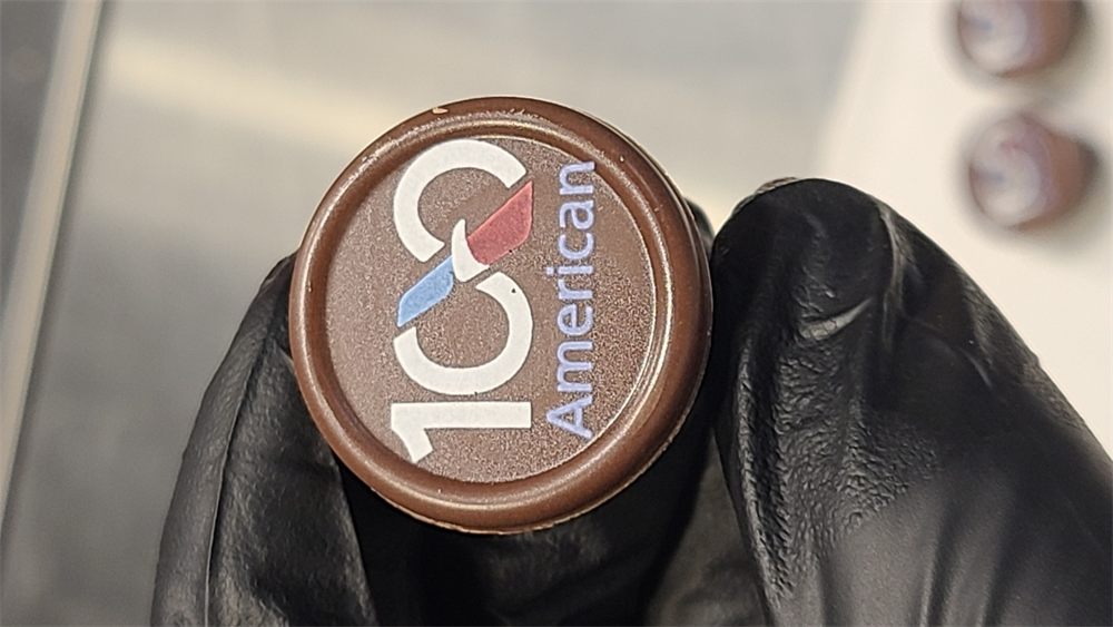 Chocolate medallion printed with a full-color company logo