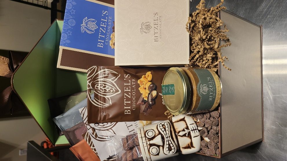 Bitzel's-branded gift box with a printed chocolate bar and tin